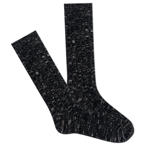 Pair of black textured socks on a white background