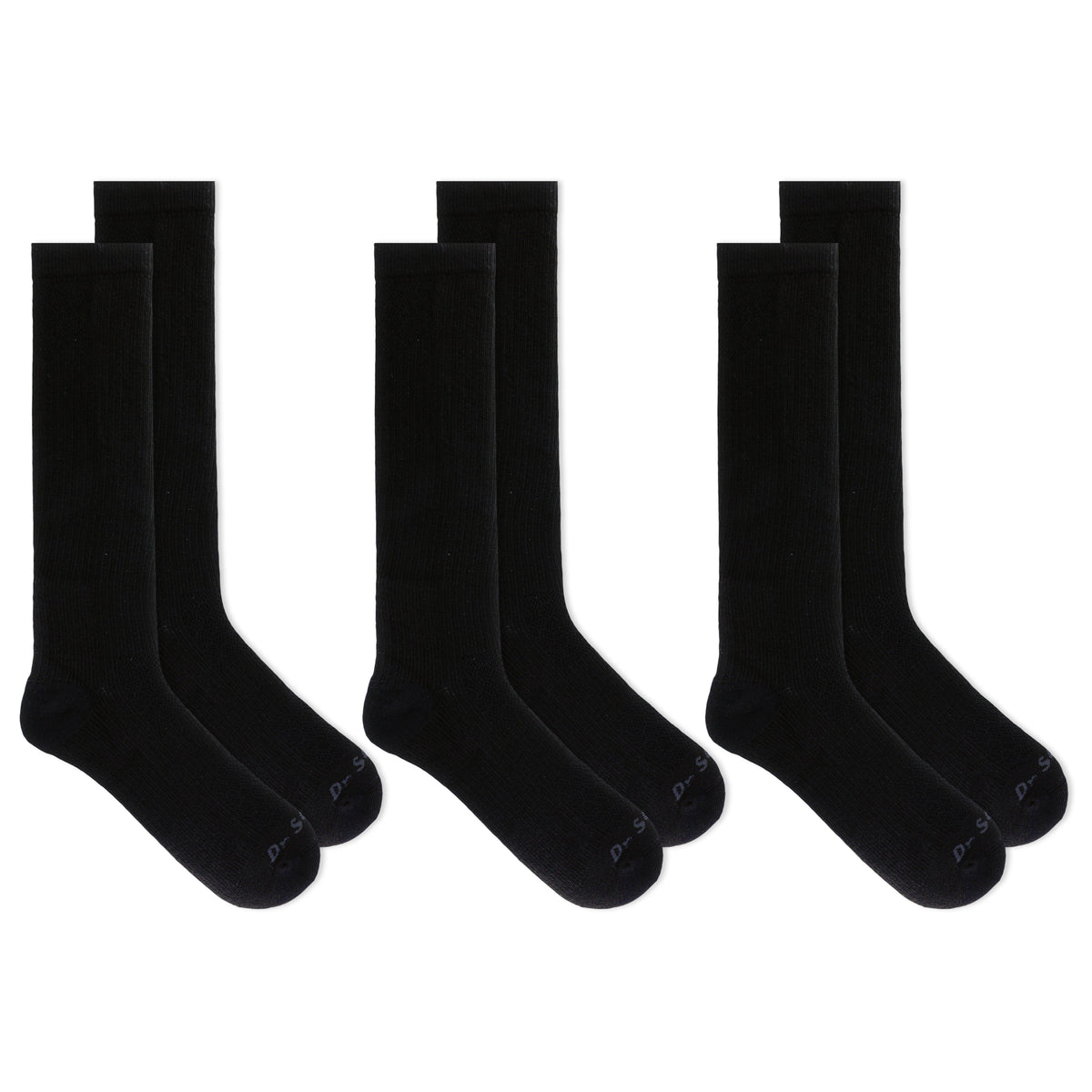 Three pairs of black socks on a white background