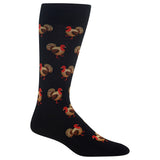 A single black crew sock with a repeating pattern of small turkeys in brown, red, and cream, shown on a plain white background.