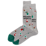 Person wearing gray 'Holiday Spirits' drink-themed socks on a white carpeted floor.