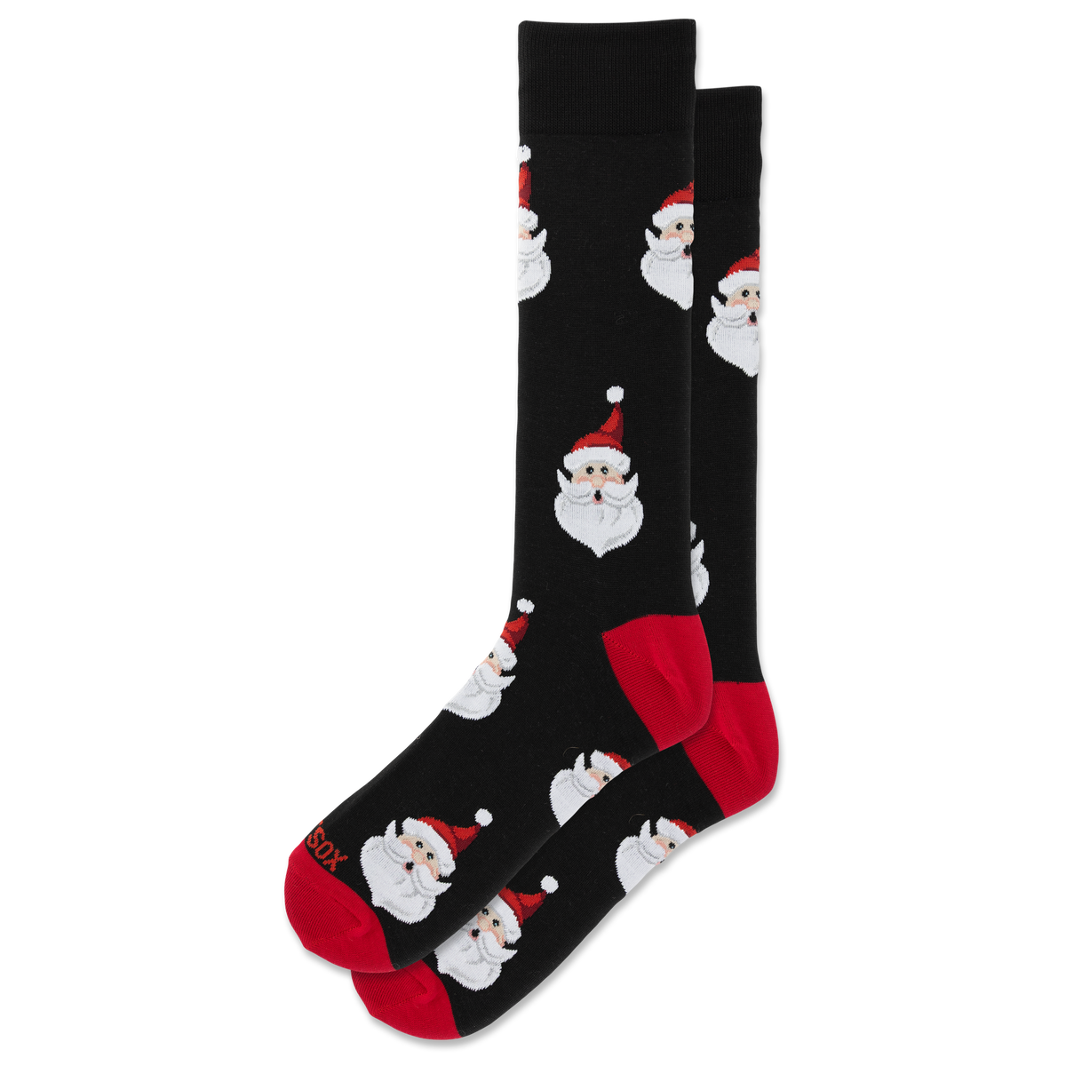 A pair of black crew socks featuring a repeating pattern of Santa Claus faces, with red heels, soles, and toes.