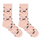 A pair of crew socks in a light peach-pink color, printed with a playful pattern of various sushi and sashimi illustrations, shown against a plain white background. thumbnail