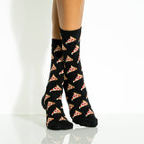 Black socks with pizza pattern worn by a woman on a white background thumbnail