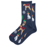 A pair of navy blue crew socks featuring a festive Christmas pattern with Jack Russell Terrier dogs wearing red scarves and green hats, decorated with snowflakes and a small Christmas tree.