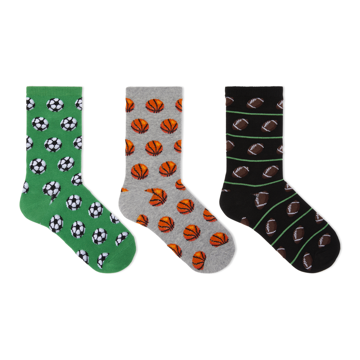 Three pairs of crew socks displayed side by side on a plain white background. The left pair is green with black and white soccer ball patterns, the middle pair is gray with orange basketball patterns, and the right pair is black with brown football patterns and thin green stripes.