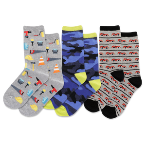 Three pairs of children's socks with different patterns on a white background
