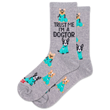 Gray socks with cartoon dog illustrations and text 'Trust Me I'm a Dogtor' on a white background