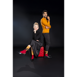 Man and woman posing together on a black background thumbnail