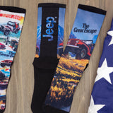 Set of socks with Jeep-themed designs on a wooden surface thumbnail