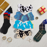 Collection of colorful socks with various patterns on a light gray surface. thumbnail