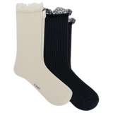 Two ribbed crew socks with lace trim at the top, shown overlapping on a white background. The front sock is cream, and the back is black.
