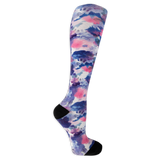 Dr. Scholl's women's compression socks featuring a black and white tie dye pattern and black accents at the heel and toe. thumbnail