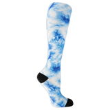 Dr. Scholl's women's compression socks featuring a blue and white tie dye pattern and black accents at the heel and toe. thumbnail