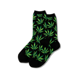 Black socks with green marijuana leaf pattern on a white background