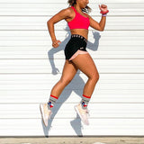 Person running outdoors with a white wall background thumbnail