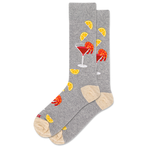 Gray socks with shrimp cocktails and orange slice designs on a white background