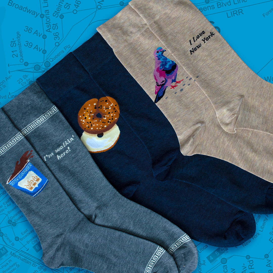 Assorted men's HOTSOX novelty-themed socks with New York motifs.