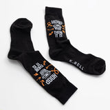 Black socks with text and graphics on a white background thumbnail