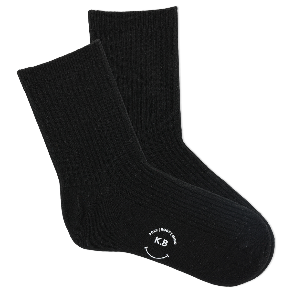 Pair of black socks with a smiley face and initials on a white background