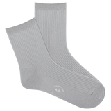 Pair of metallic silver socks on a white background
