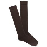 Pair of brown knee-high socks on a white background