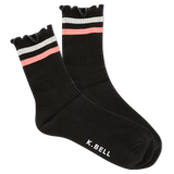 Black socks with pink and white stripes on a white background, featuring the brand 'K. Bell'. thumbnail
