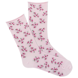 Pink socks with floral pattern on a white background