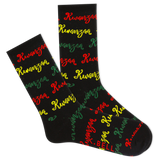 A pair of women's crew socks with a Kwanzaa theme, featuring the word 'KWANZA' in a colorful pattern on a black background.
