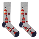 A pair of men's crew socks with a bourbon design, featuring illustrations of bourbon bottles and a glass on a gray background.